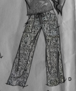 Photo mock up of a wide legged trouser with patch pockets in a swirly black and white print